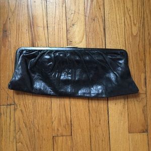 Leather Clutch With Retractable Handle
